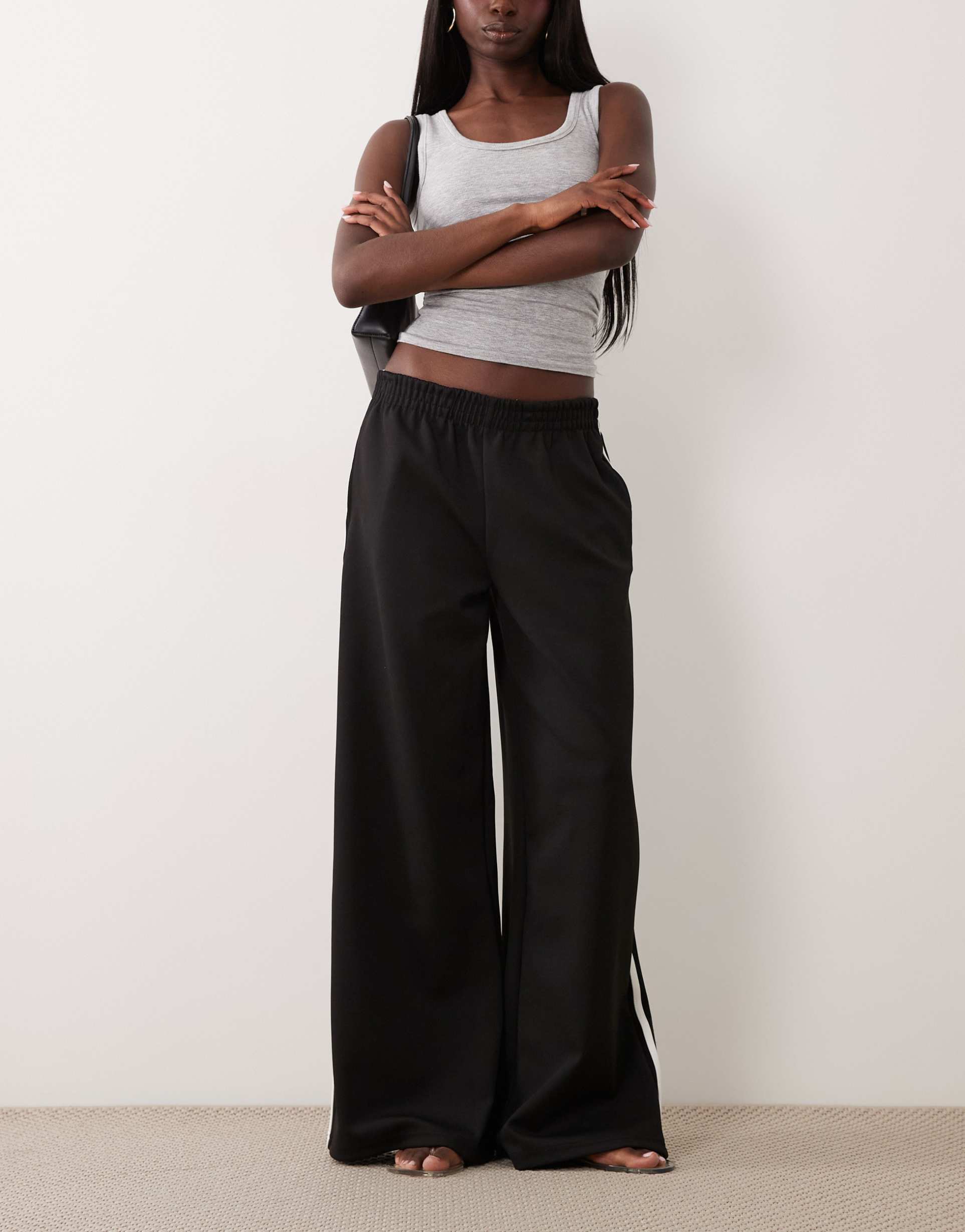 gina tricot sporty wide pants in black with white stripe