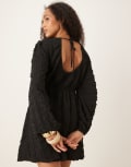 [GINA TRICOT] Gina Tricot textured mini dress with open tie back and volume sleeves in black XS BLACK