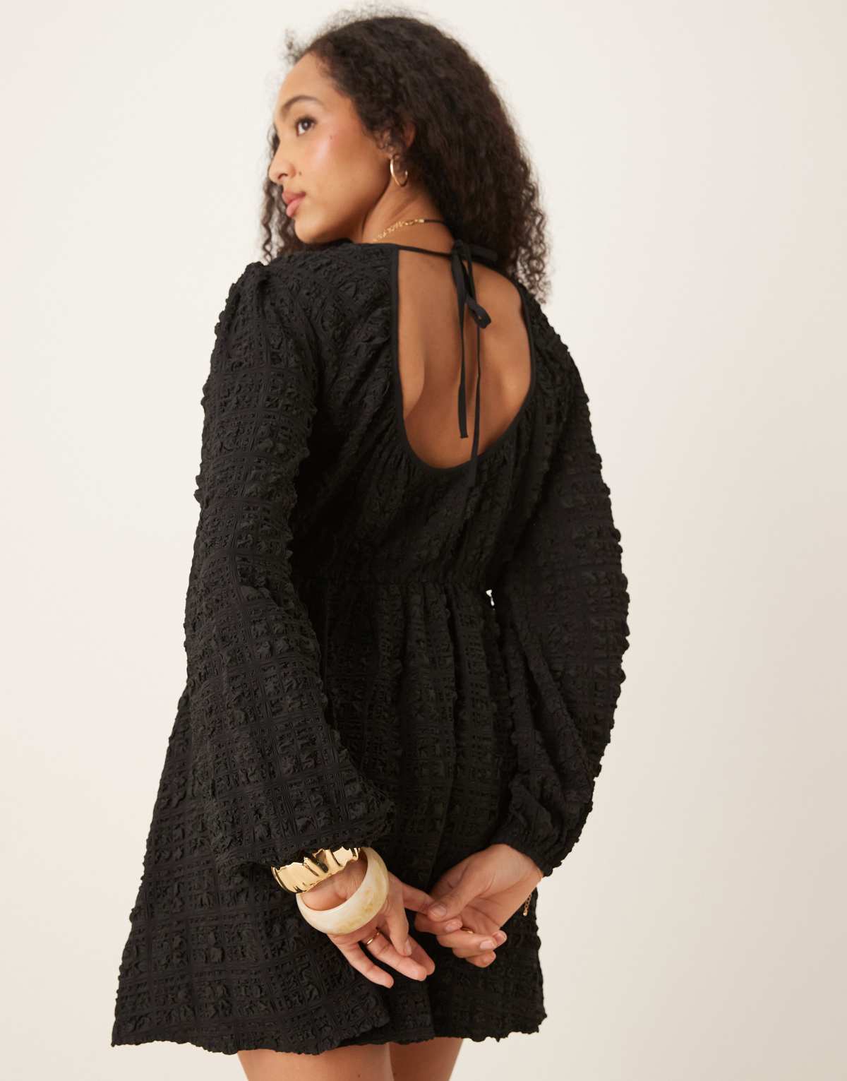 Gina Tricot textured mini dress with open tie back and volume sleeves in black