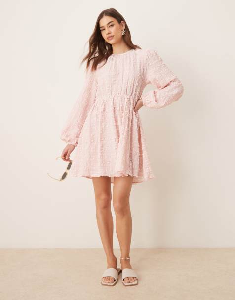 Gina Tricot textured mini dress with open tie back and volume sleeves in pink - view 1