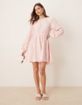 [GINA TRICOT] Gina Tricot textured mini dress with open tie back and volume sleeves in pink S PINK