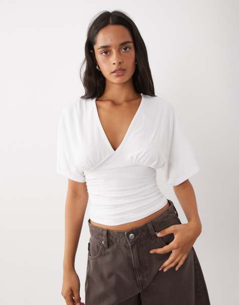 Gina Tricot top bianco con scollo a V profondo e maniche a pipistrello - view 1