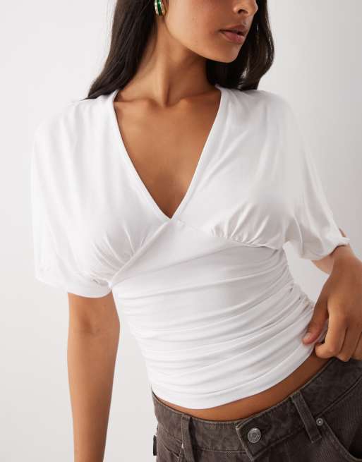 Gina Tricot top bianco con scollo a V profondo e maniche a pipistrello, 4 di 4