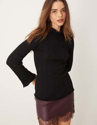 Gina Tricot - Top côtelé en maille à manches longues à col cheminée et manches évasées - Noir