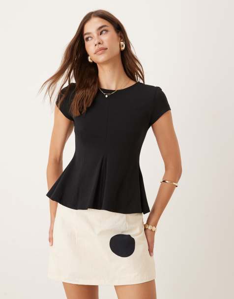 Gina Tricot - Top en jersey avec manches courtes et ourlet à basque - Noir - view 1