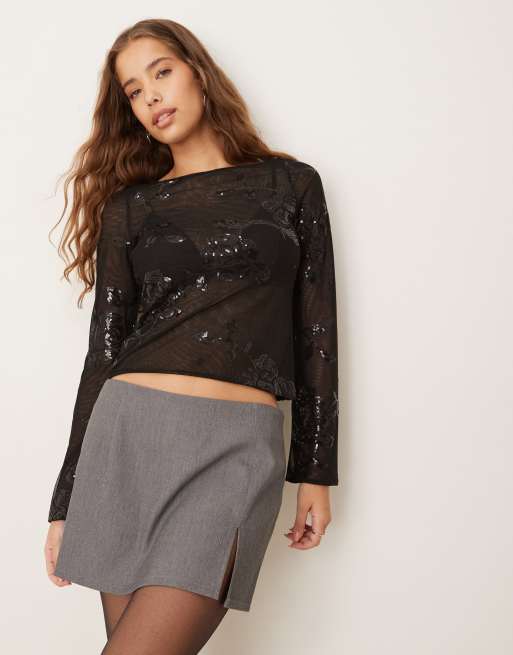 Gina Tricot - Top met lange mouwen, bloemmotief en lovertjes in zwart