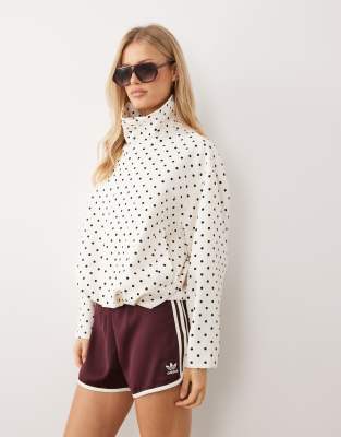 Gina Tricot - Veste courte à pois et col montant - Blanc