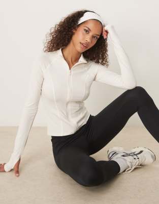 Gina Tricot - Veste de sport zippée sans coutures en tissu doux - Blanc cassé