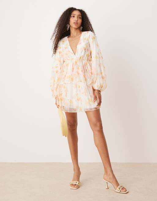 Gina Tricot - Vestito corto a maniche lunghe con scollo a V e stampa multicolore effetto acquerello