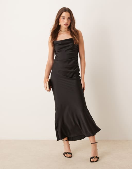 Gina Tricot - Vestito lungo in raso nero con taglio sbieco e schiena scoperta con inserto in pizzo