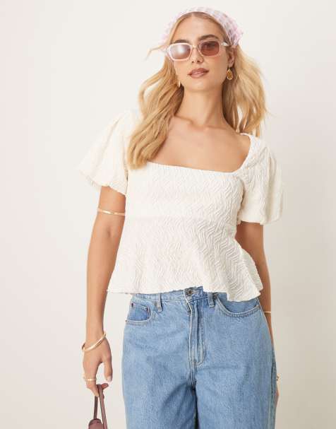 Gina Tricot wavy textured jersey with puff sleeves and peplum hem in ecru white - view 1