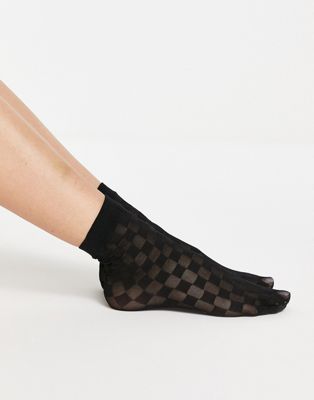 Gipsy sheer mesh checkerboard sock in black