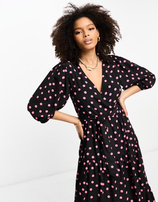 Pink dress shop with black spots