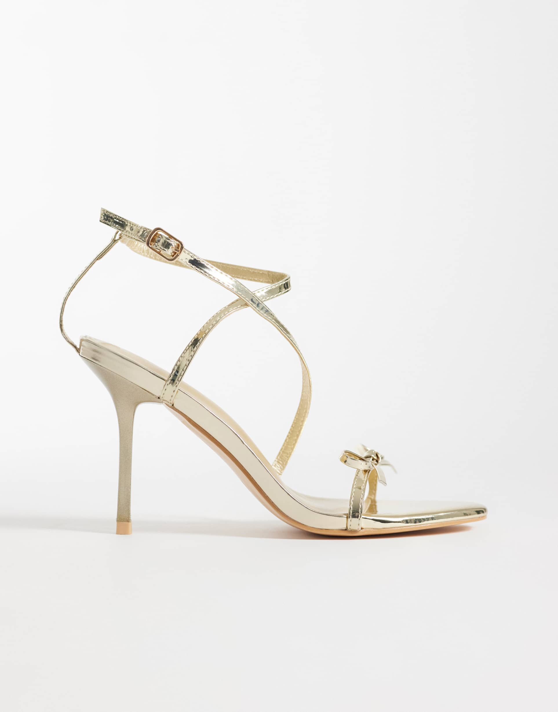 glamorous barely there heeled sandals with bows in gold