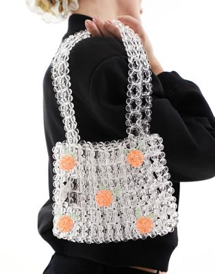 Glamorous beaded handbag with oranges in clear