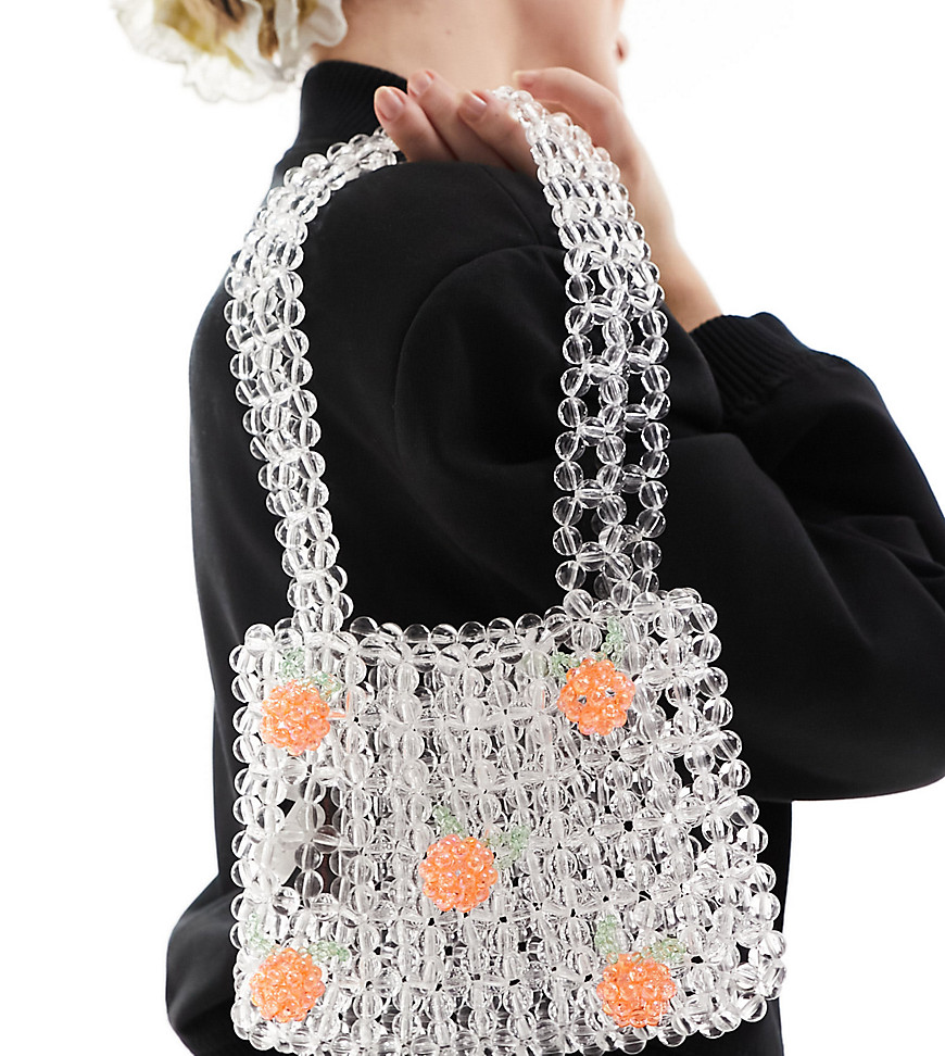 Glamorous beaded handbag with oranges in clear
