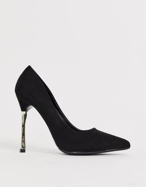 Black shoes store with gold heels