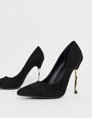 black high heels with gold heel