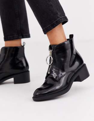 black patent zip front boots