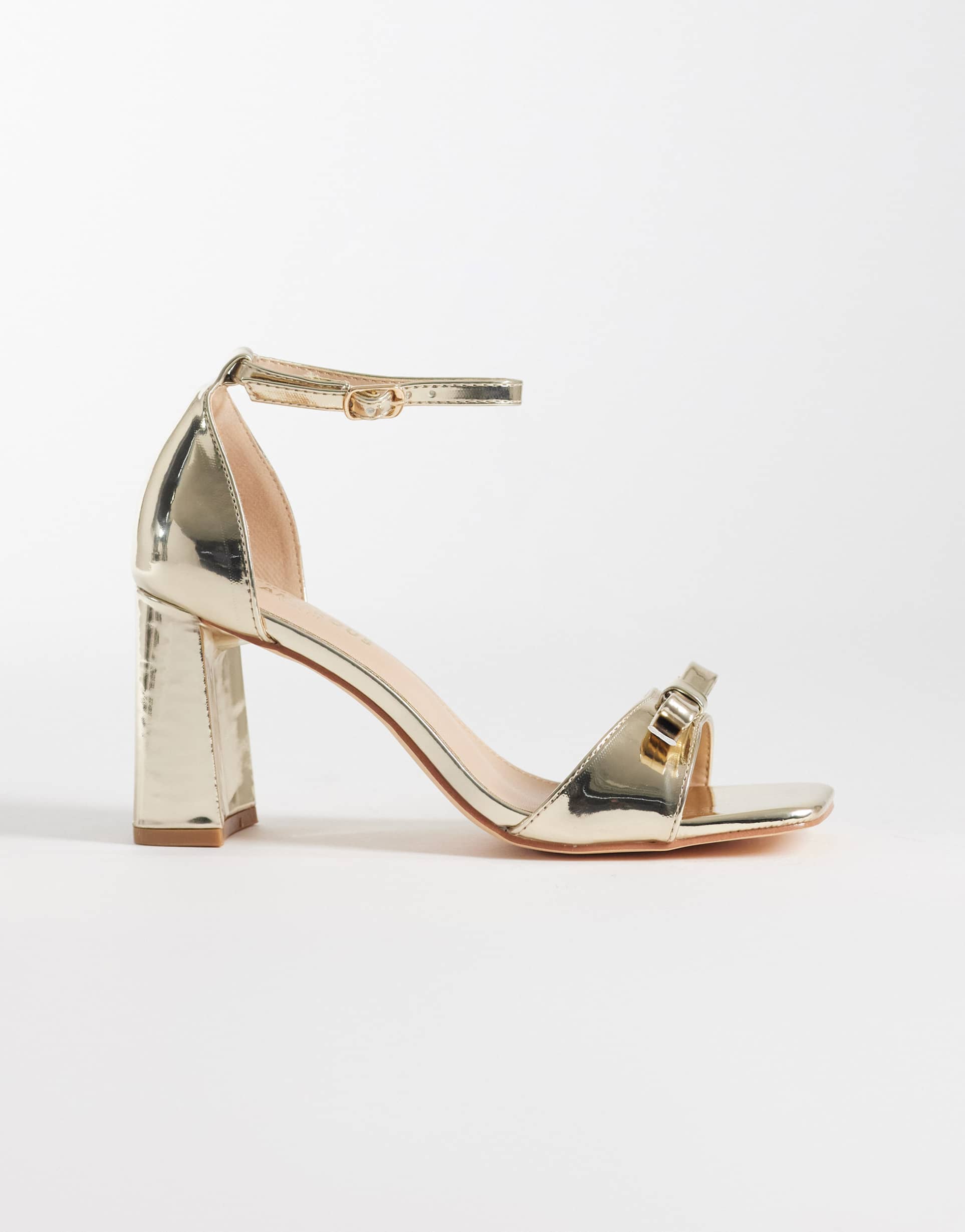 glamorous block heeled sandals with bow in gold