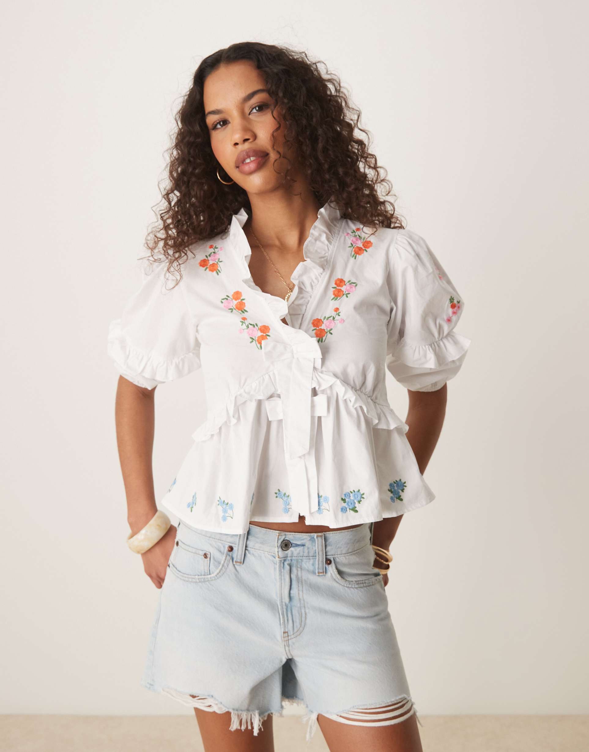 glamorous boho frill blouse with floral embroidery in white
