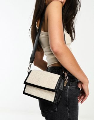 Glamorous borg panelled crossbody bag with webbing strap in black and cream