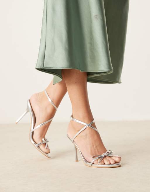 Glamorous bow heeled sandals in silver crinkle