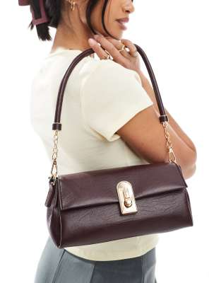 classic shoulder bag with gold clasp in dark brown