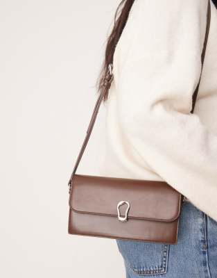 clean crossbody flap bag in brown with silver detail