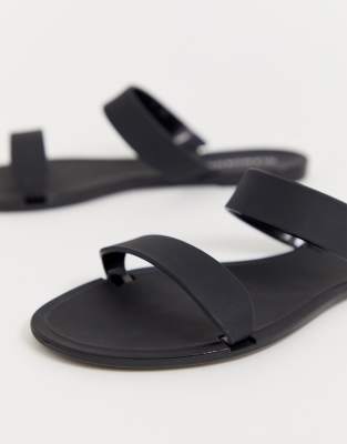 black jelly flip flops