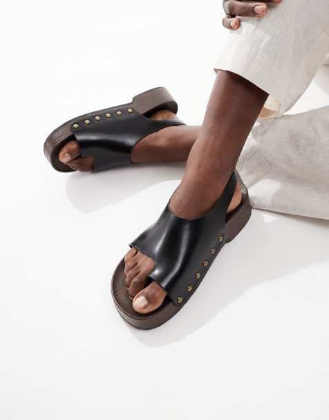 Glamorous clog sandals in black - view 1