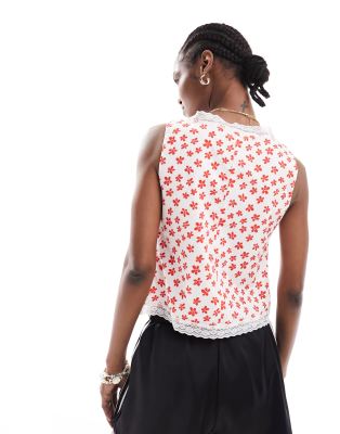 glamorous corset detail tie front top with lace trim in red daisy print