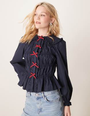 Glamorous Glamorous crinkle long sleeve top with red tie front bows in navy