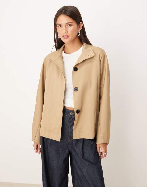 Glamorous cropped cape style trench coat in beige - view 1