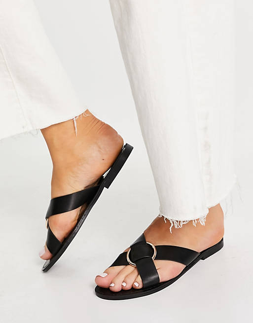 Glamorous cross strap flat sandals with gold ring in black