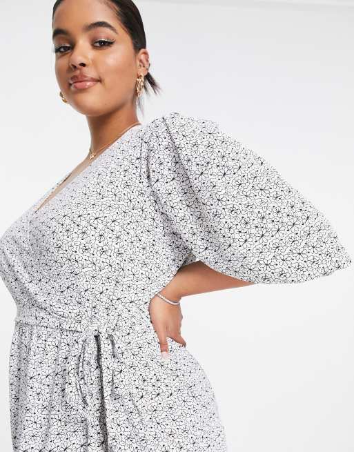 Glamorous Curve– Langärmliges Midi-Wickelkleid mit schwarzem Gänseblümchenmuster, 3 von 4