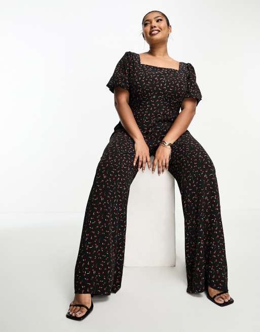 Glamorous Curve milkmaid wide leg jumpsuit with tie back in black rose ...