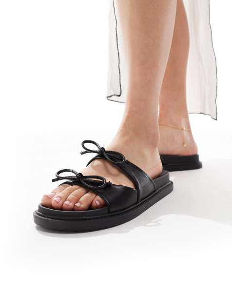 Glamorous double bow footbed sandals in black - view 1