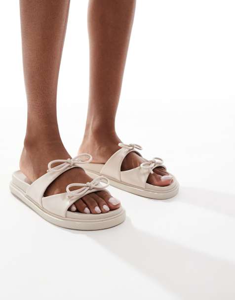 Glamorous double bow footbed sandals in cream - view 1