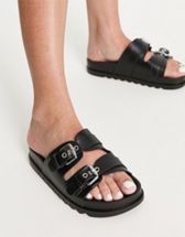 ASOS DESIGN Wide Fit Frenzy cross strap flat sandals with chain in black