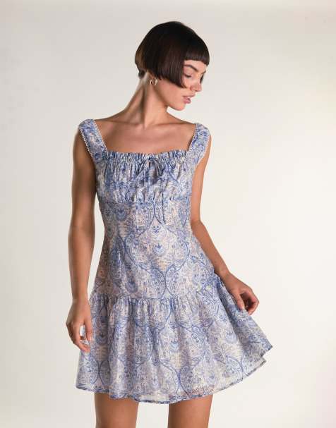 Glamorous Drop waist mini dress in white blue paisley