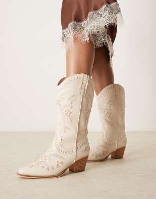 embroidered western knee boots in cream-White