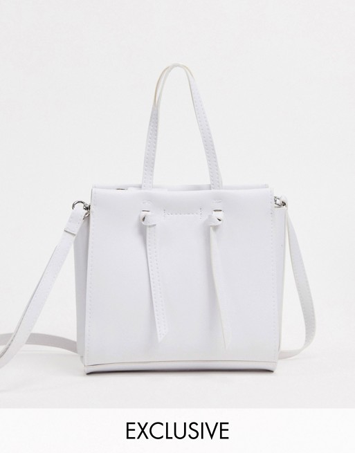 Glamorous Exclusive mini cross body bag with tassel detail in white