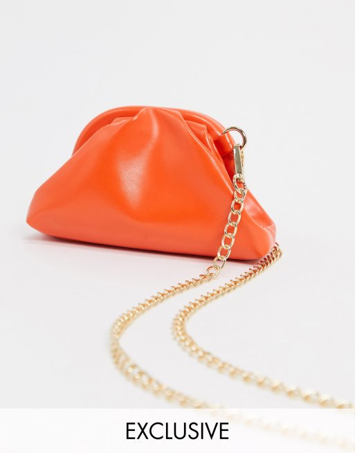 Orange clutch store bag asos