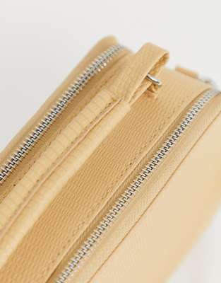 beige camera bag