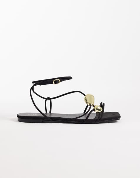 Glamorous – Flache Sandalen in Schwarz mit Golddetail - view 1