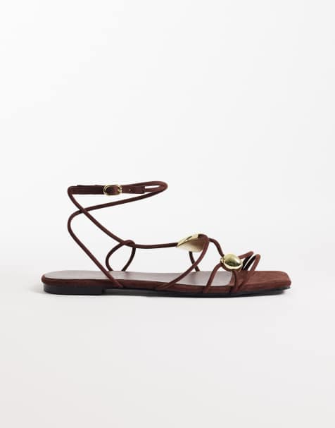 Glamorous flat sandals with molten detailing in brown suedette and gold - view 1