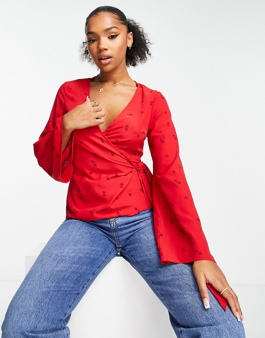Glamorous fluted sleeve wrap blouse in red floral