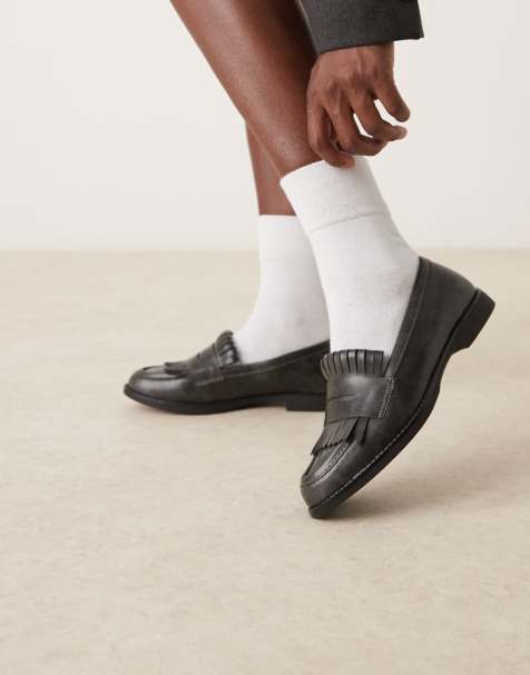 Glamorous fringed loafers in black - view 1