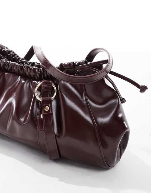 Glamorous gathered shoulder bag in deep burgundy